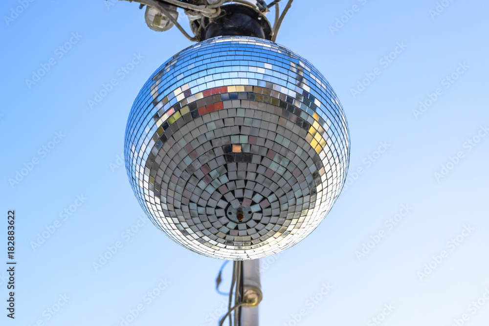 Stroboscope hanging on the wires. Stroboscope for a street disco.