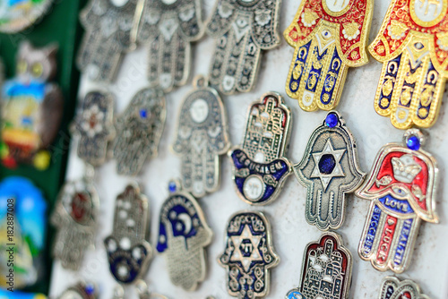 Souvenirs at Jerusalem bazaar, hamsa or khamsa symbol of Judaism © Stanislav Samoylik