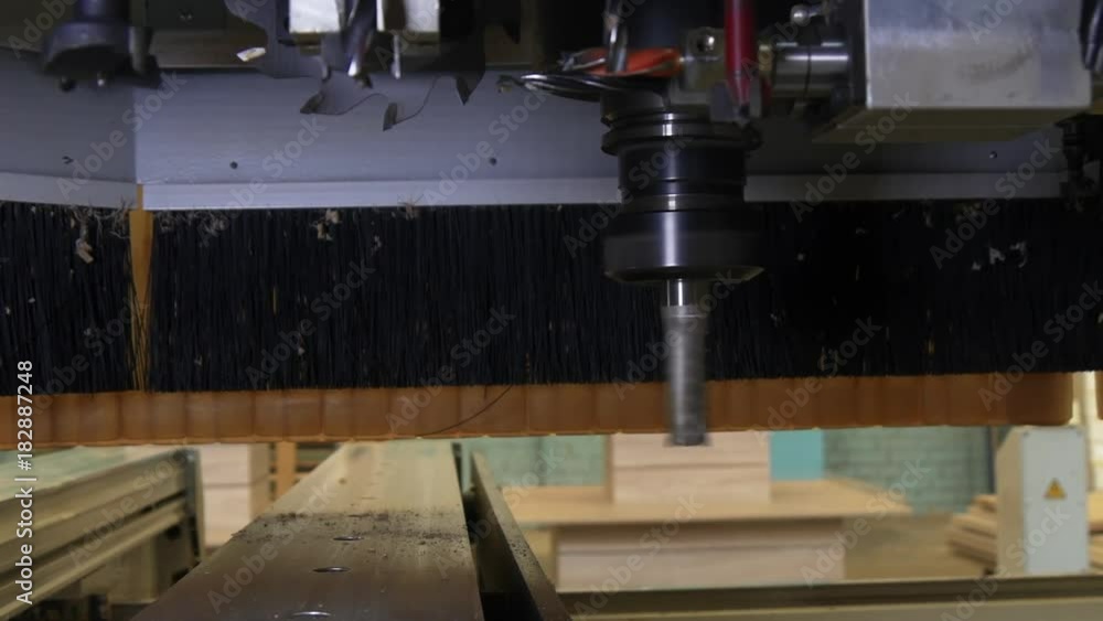 Milling machine wood CNC for industrial furniture production. Modern technologies of woodworking industry on professional equipment. Milling machine wood CNC for industrial furniture production. Modern technologies of woodworking industry on professional equipment.