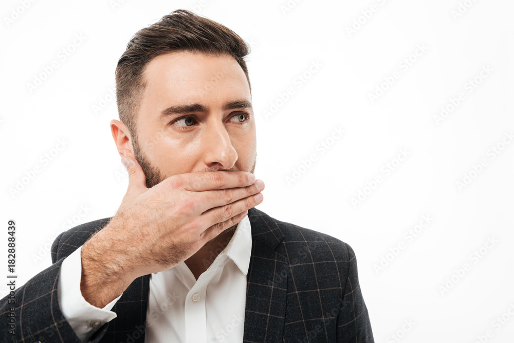 Close up portrait of a scared young bearded man Close up portrait of a scared young bearded man