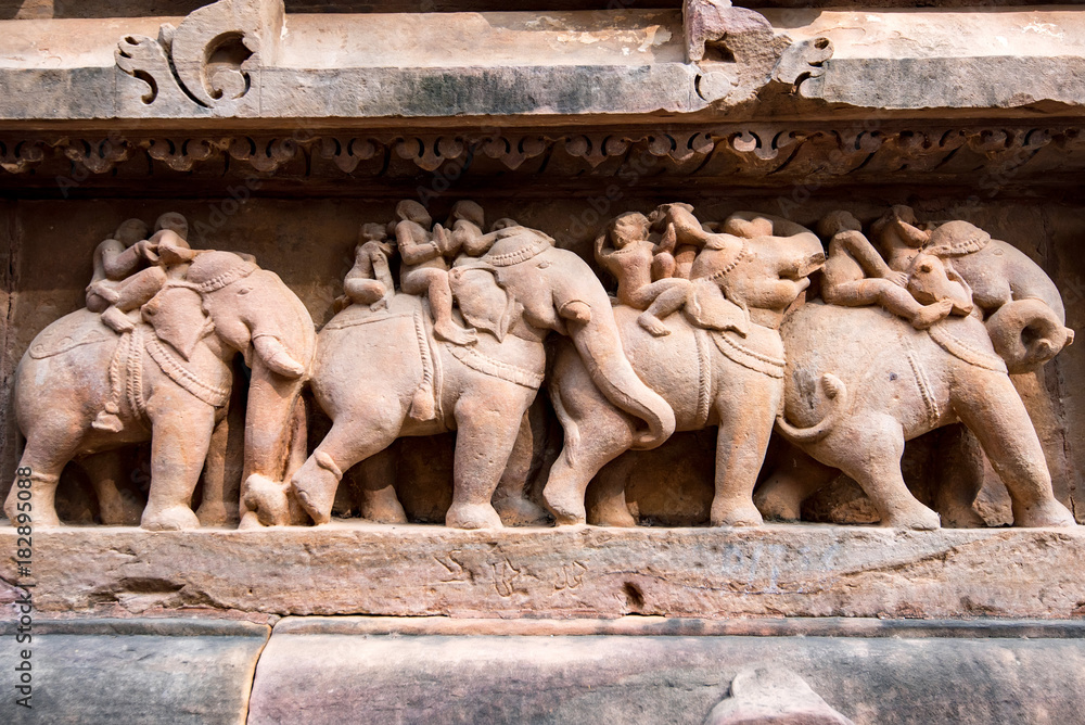Close up erotic stone carving in Lakshman Temple Close up erotic stone carving in Lakshman Temple
