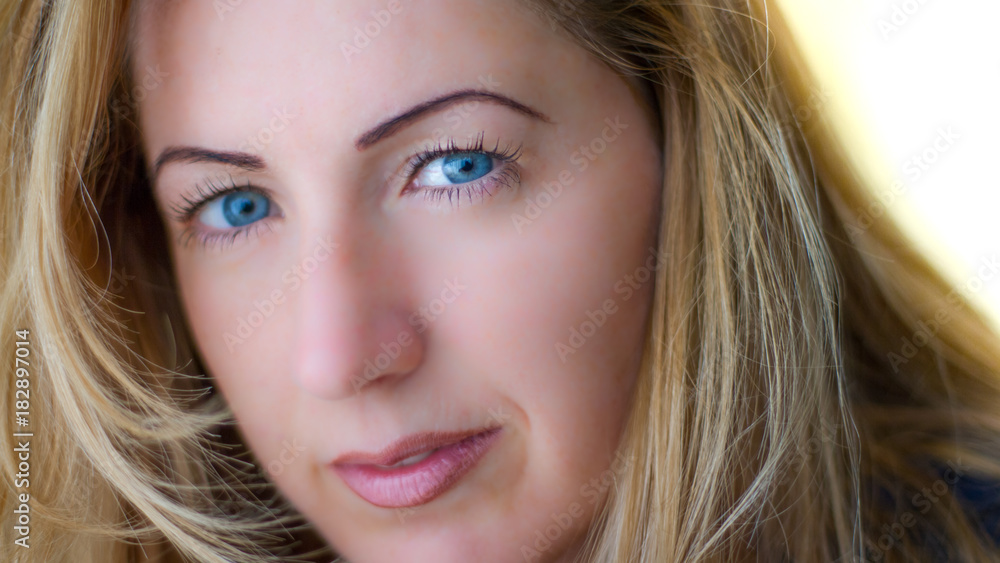 Young beautiful and attractive woman sexy portrait. Blue eyes and blonde hair Young beautiful and attractive woman sexy portrait. Blue eyes and blonde hair