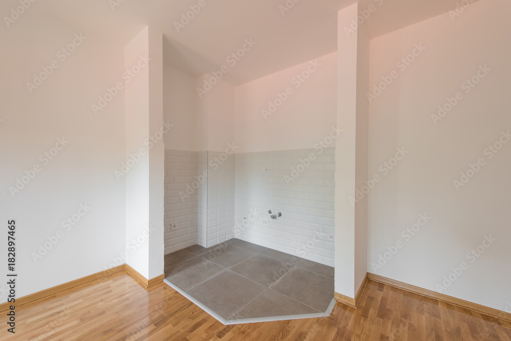 Fototapeta premium Space with tilles for kitchen in empty apartment