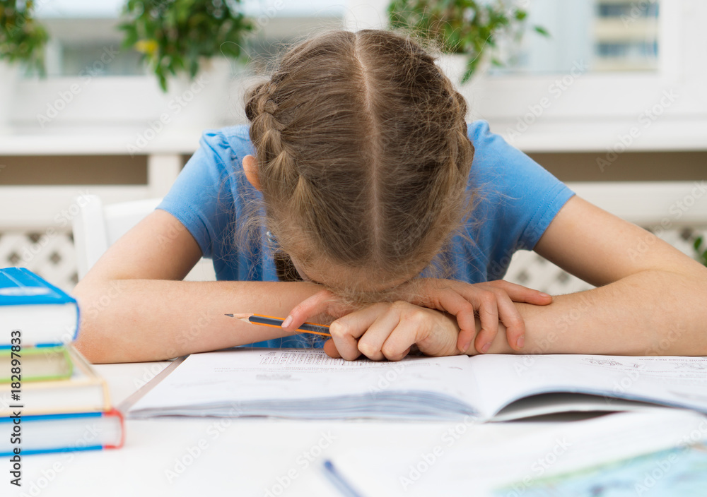 Little girl don't want to do her homework. Little girl don't want to do her homework.