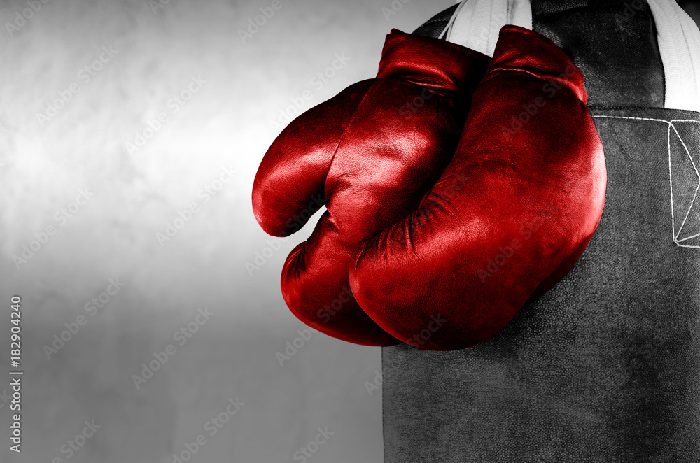 Red Boxing gloves on boxing bag background
