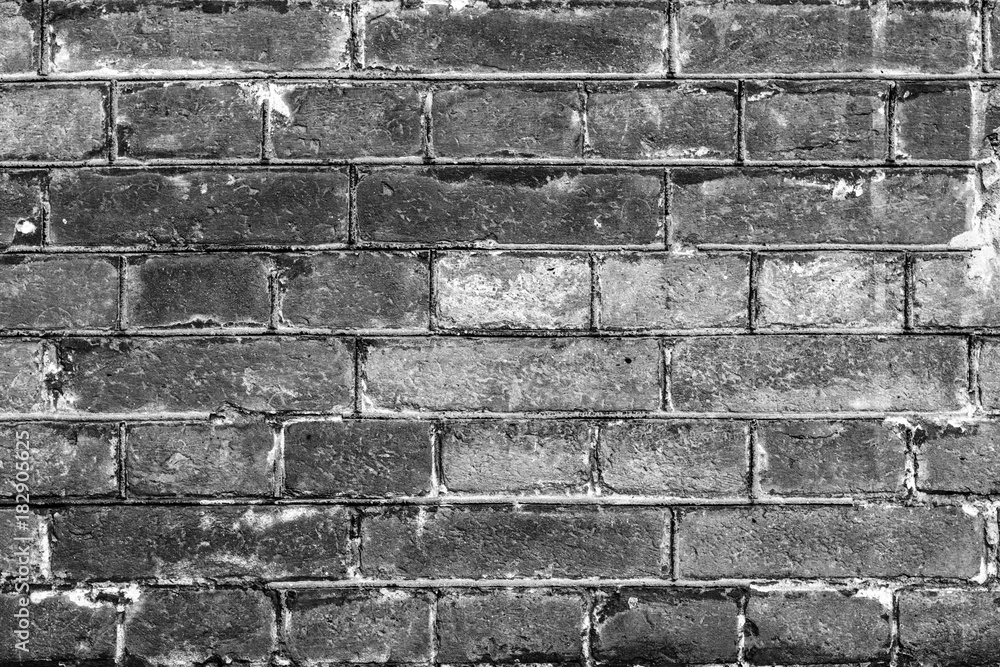 Fototapeta premium Brick texture with scratches and cracks