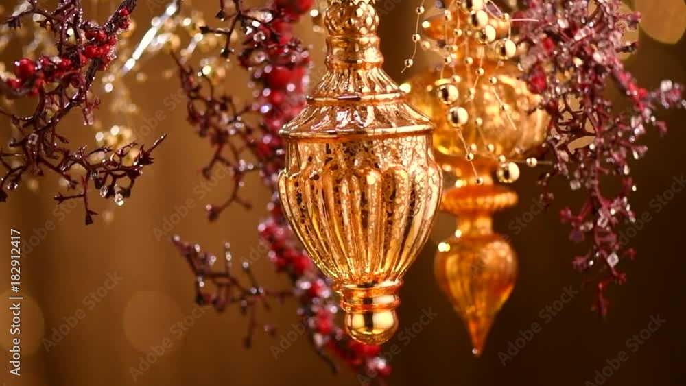 Christmas and New Year golden decoration. Abstract blinking holiday background. Slow motion 4K UHD video footage. 3840X2160 Christmas and New Year golden decoration. Abstract blinking holiday background. Slow motion 4K UHD video footage. 3840X2160