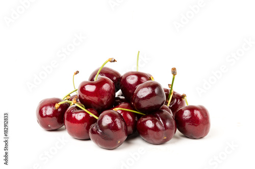 Red cherries fruit on white background
