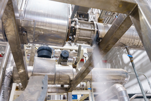 Leakage of steam in heat pipeline. Steam outgoing from the rusty tube with valve