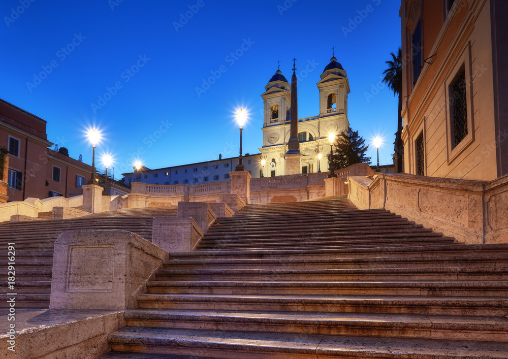 Monumental staircase Spanish Steps and and Trinita dei Monti church at night