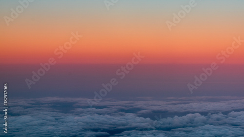 sunset view from an airplane window © Taylor