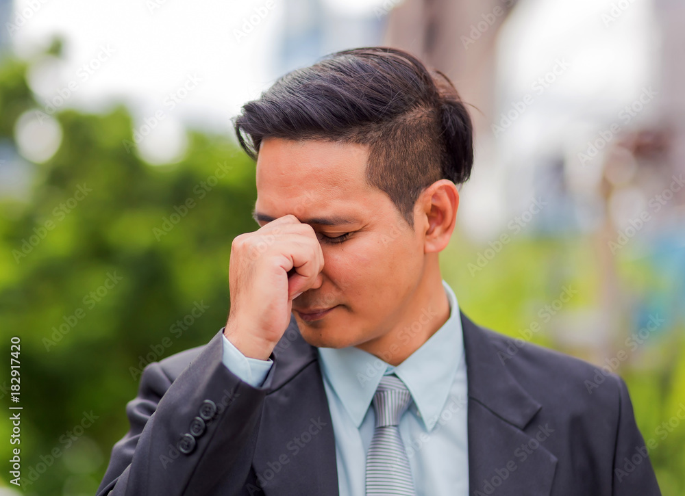 Business man tired or stressed after his work. Image of Stressed businessman concept. Business man tired or stressed after his work. Image of Stressed businessman concept.