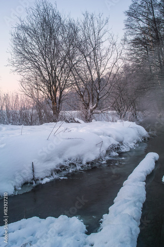 River on the frozen winter day © Alexey Pelikh
