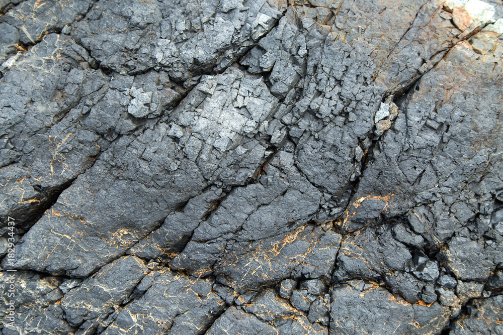 Naklejka premium Stone texture background/Detail of sand stone texture/Natural slate stone background texture/Stone abstract background/Colorful natural stone background/Rock texture and background/Stone/