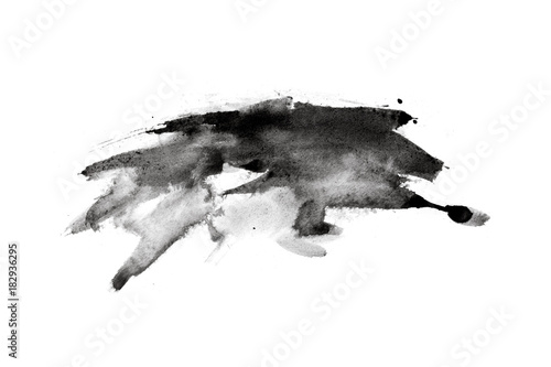 abstract black splashes on white watercolor paper. monochrome image.