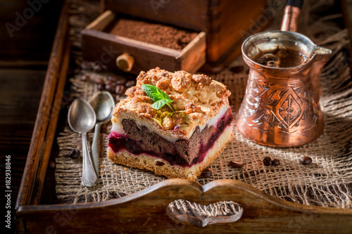 Delicious cherry pie with coffe grinder and grains