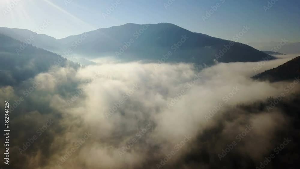 Aerial view of the mountains with a morning fog Aerial view of the mountains with a morning fog