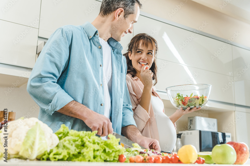 couple making salad couple making salad