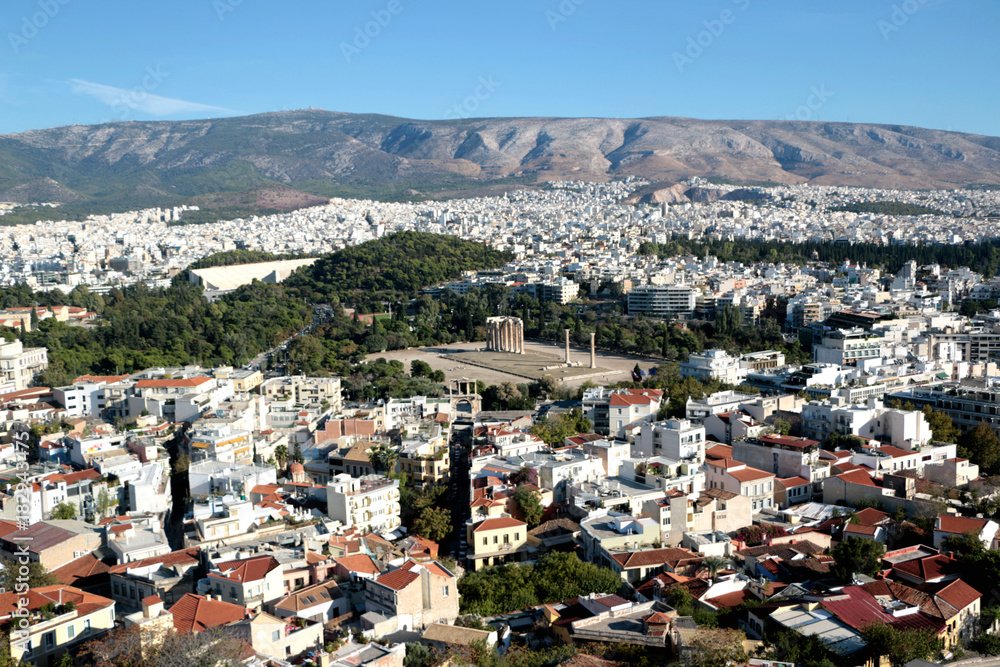 Temple of Olympian Zeus Olympieion as seen from Acropolis, Athens, Greece. Cityscape of Athens on background