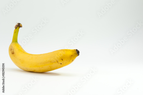 Healthy, fresh banana on focus, isolated on white background, text space.