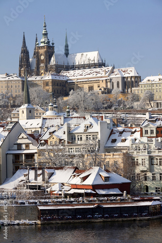 Christmas snowy Prague Lesser Town with gothic Castle, Czech republic