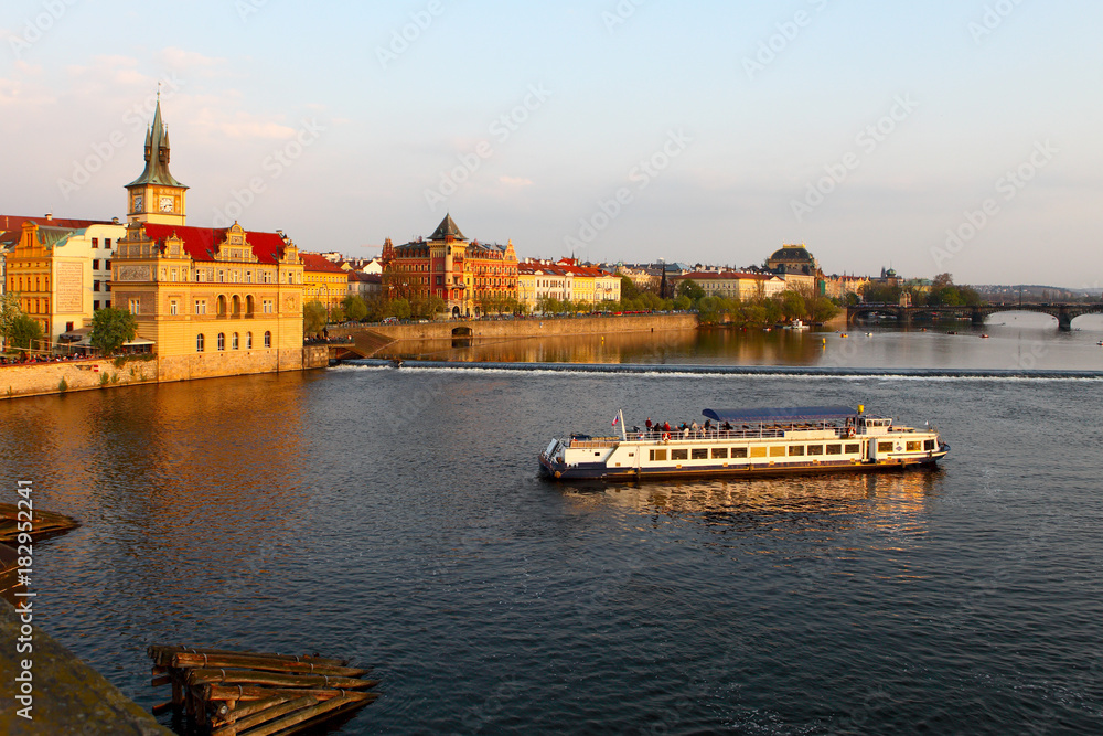 Tourist boat floating on the Vltava river.