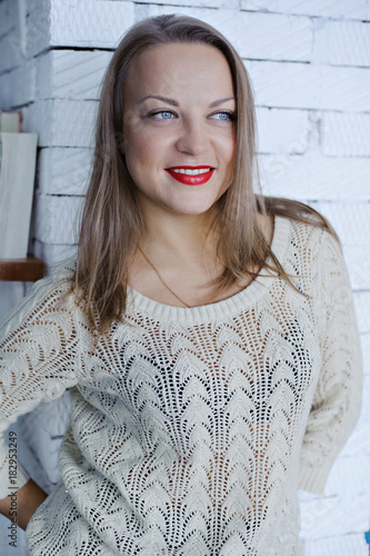 Wallpaper Mural Portrait of a smiling young woman in front of a white brick wall. Torontodigital.ca