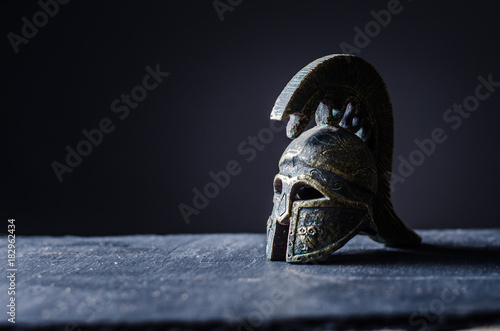 Canvas Print roman helmet on a black background
