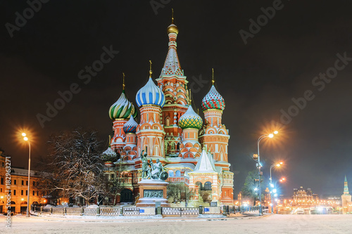 St. Basil's Cathedral in Moscow in winter, Russia. The inscription on the monument in Russian: Citizen Minin and Prince Pozharsky from Grateful Russia