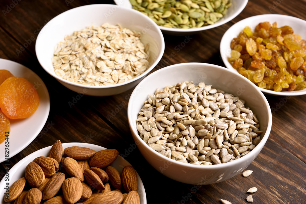 Healthy breakfast with nuts, seeds and dried fruits Healthy breakfast with nuts, seeds and dried fruits
