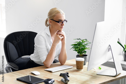Work. Woman Working On Computer In Office