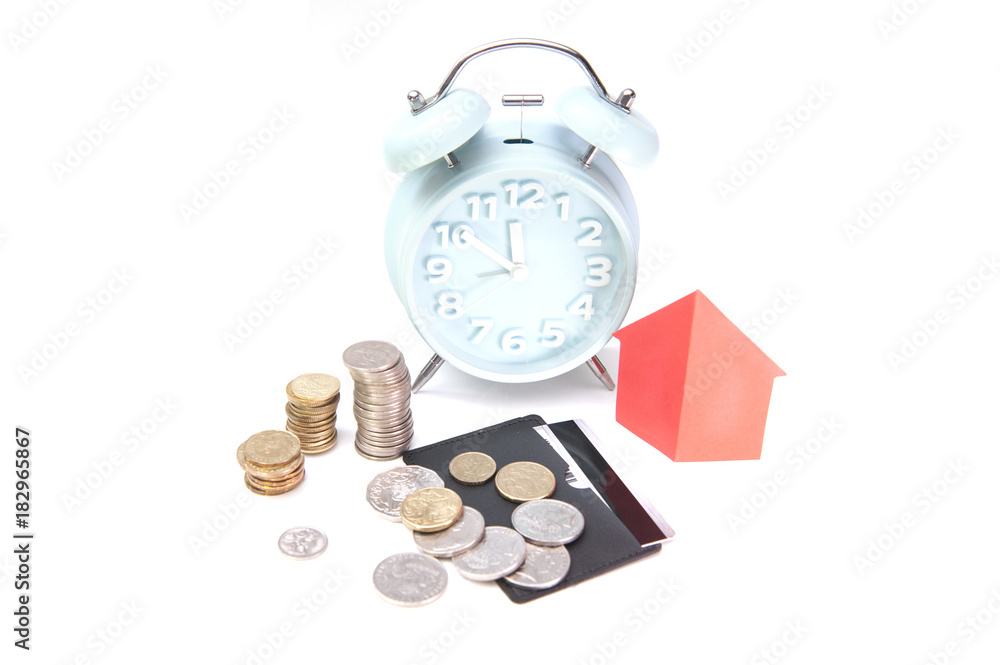 Stack of coins and House shape Paper origami.Properties Investment. Stack of coins and House shape Paper origami.Properties Investment.