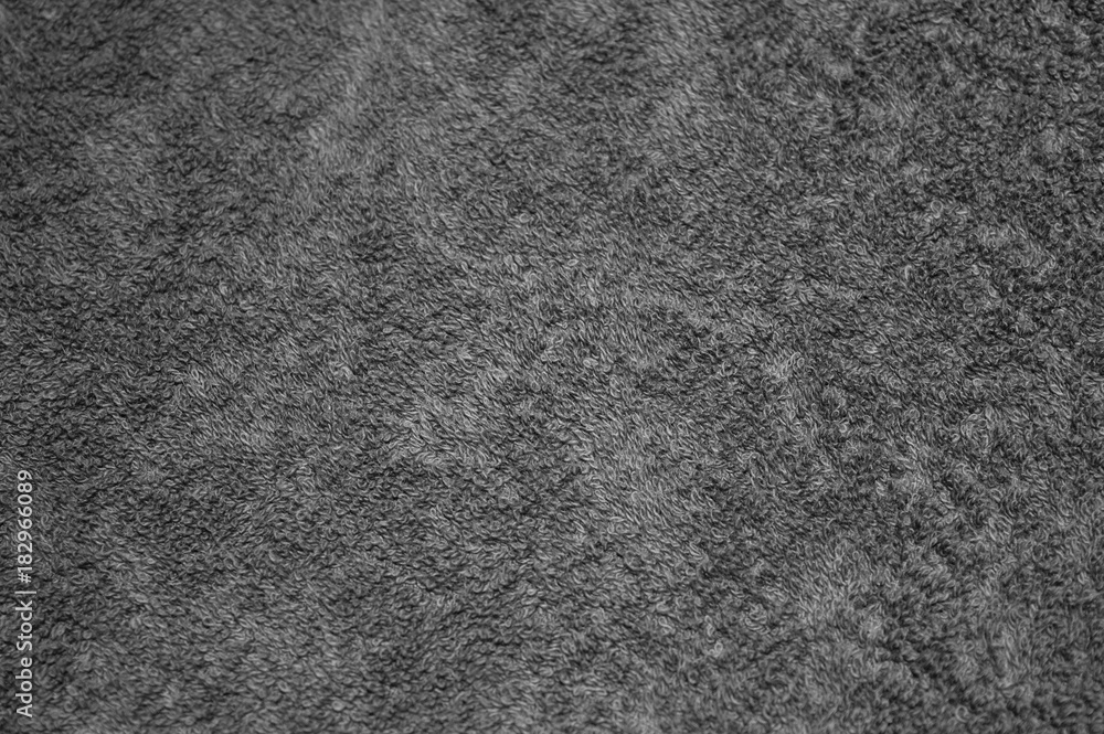 Grey cotton towel texture, fibers of bath towel background Grey cotton towel texture, fibers of bath towel background