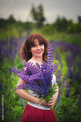 beautiful girl in a field of flowers