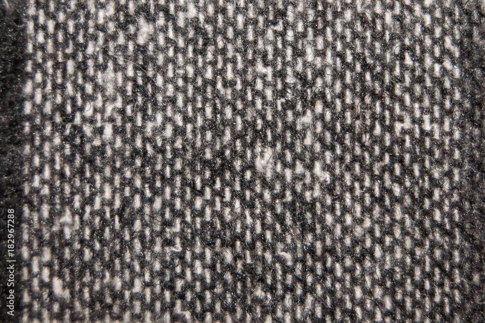knitted woolen fabric of gray and white colors