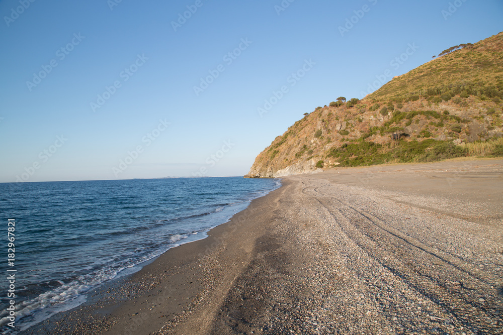 Lonely natural beach in the Nature Reserve Laghetti di Marinello 