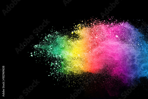 Splash of colorful powder over black background.