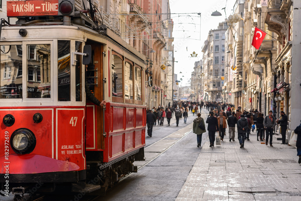 Of the places most visited by tourists, Istiklal Street, the clock is getting very crowded. - obrazy, fototapety, plakaty 