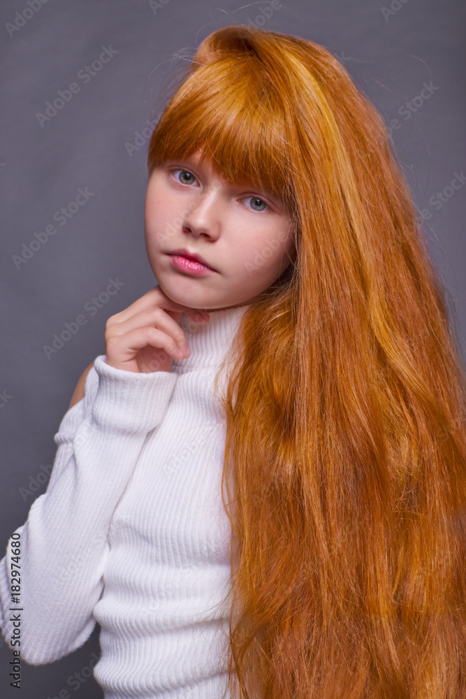 Fototapeta premium Little red haired girl background isolated