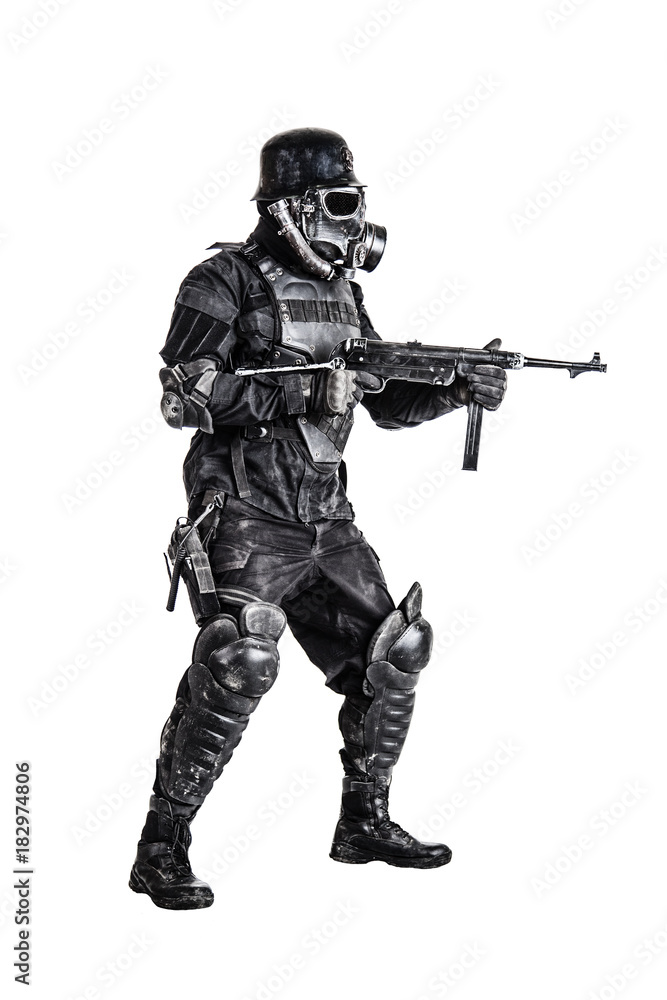 Futuristic nazi soldier gas mask and steel helmet with schmeisser handgun isolated on white studio shot full body portrait Futuristic nazi soldier gas mask and steel helmet with schmeisser handgun isolated on white studio shot full body portrait