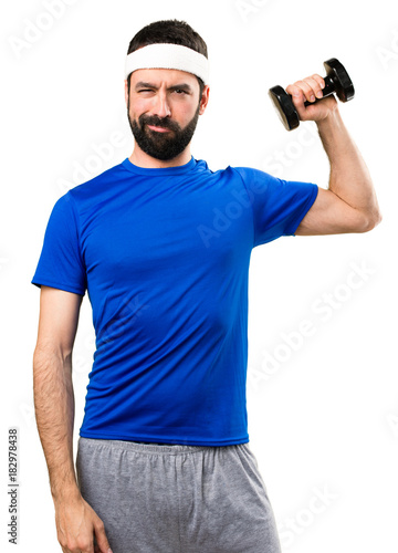 Funny sportsman making weightlifting on isolated white background