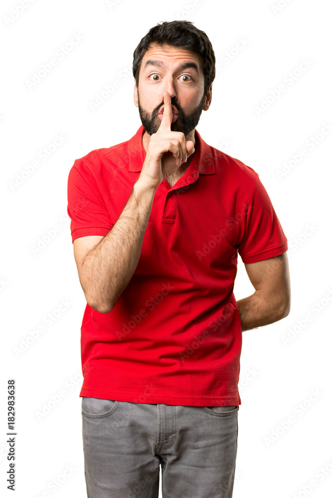 Handsome man making silence gesture Handsome man making silence gesture
