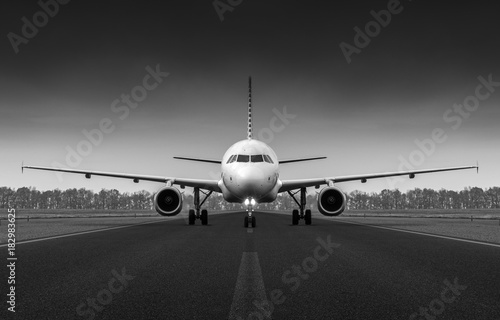 Airplane on the runway preparing to take off