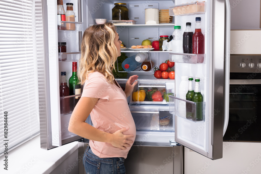 Pregnant Woman Looking For Food Pregnant Woman Looking For Food