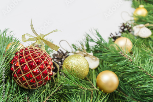 Glass ball and decorations on Christmas garland