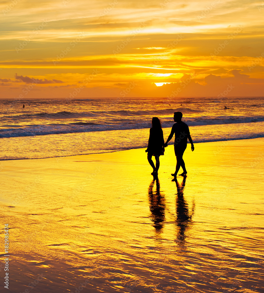 Couple walk tropical beach. Bali