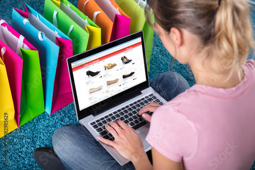 Woman Shopping Online Using Laptop