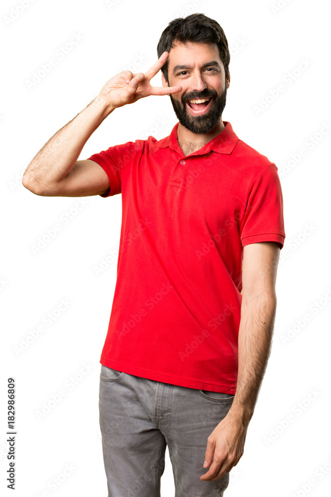 Handsome man making victory gesture Handsome man making victory gesture