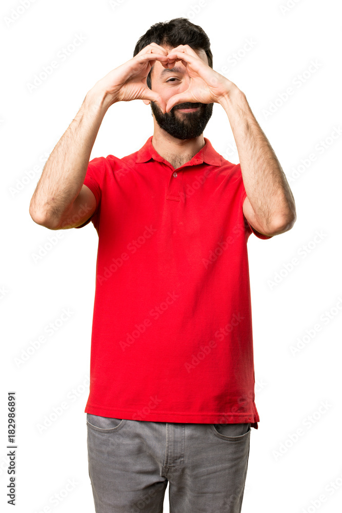Handsome man making a heart with his hands Handsome man making a heart with his hands