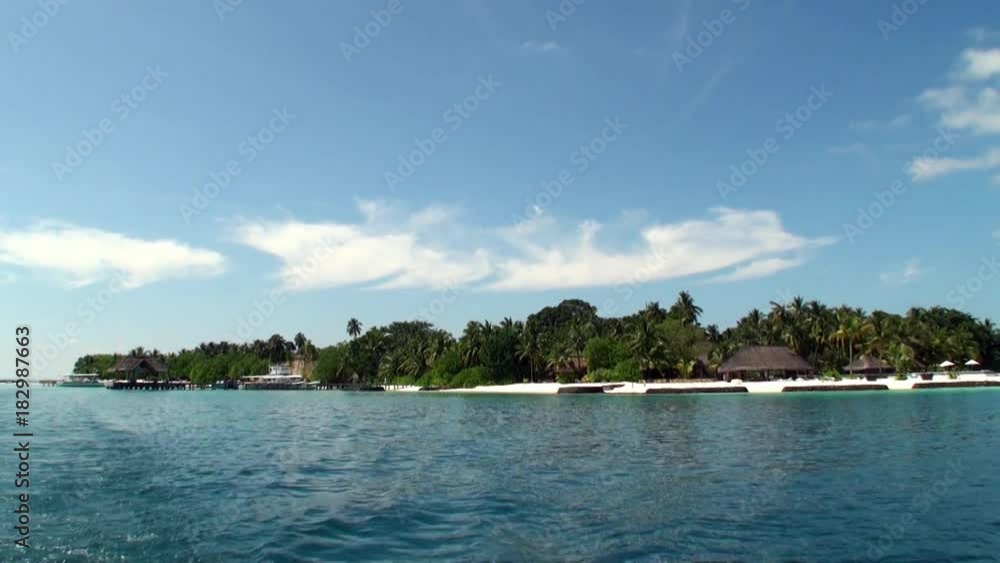 Maldives Islands on background water surface in ocean. Unique landscape. Maldives Islands on background water surface in ocean. Unique landscape.